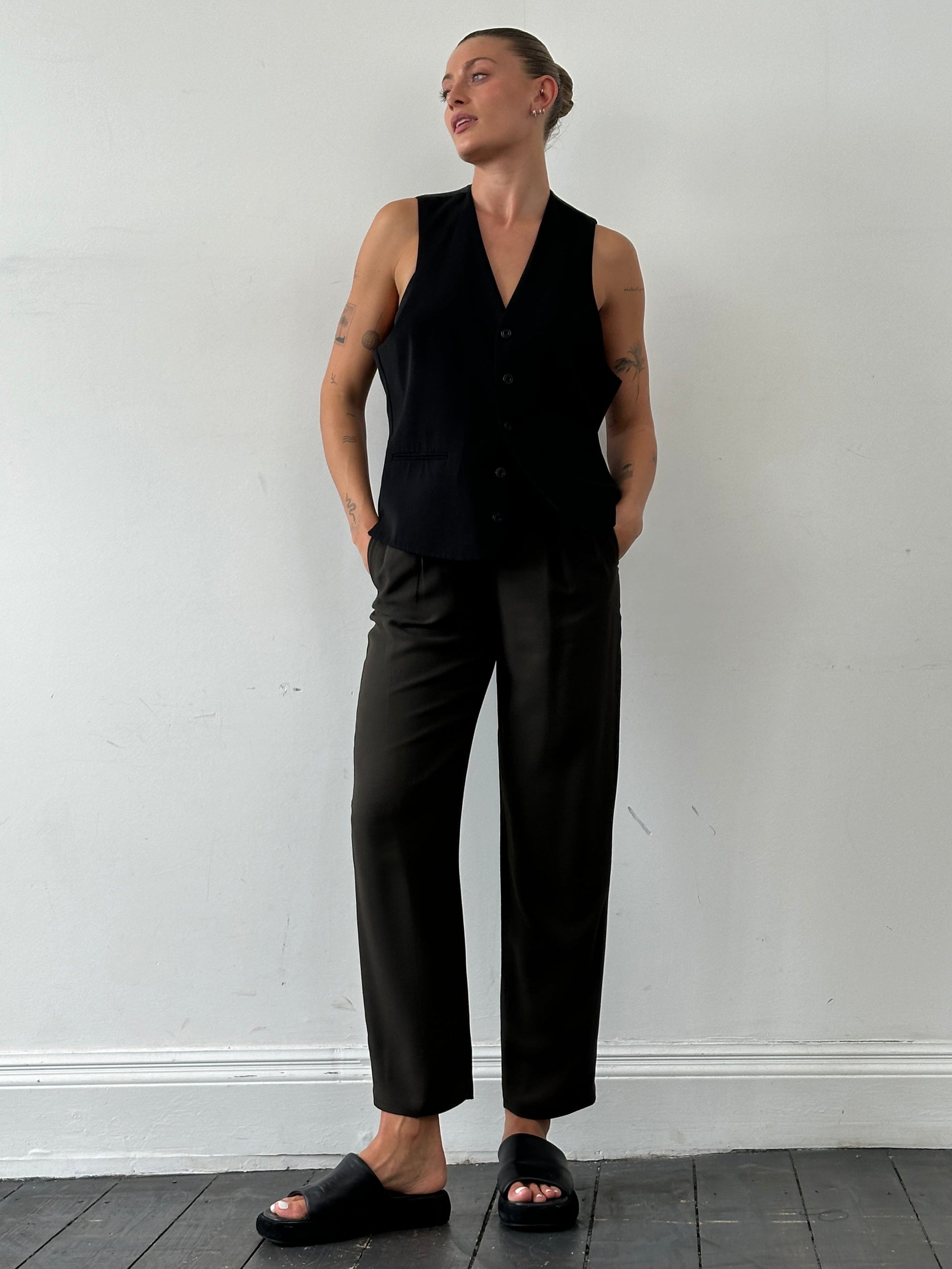 Emporio Armani high-waisted tapered leg tailored trousers in classic fabric, displayed on a neutral background.