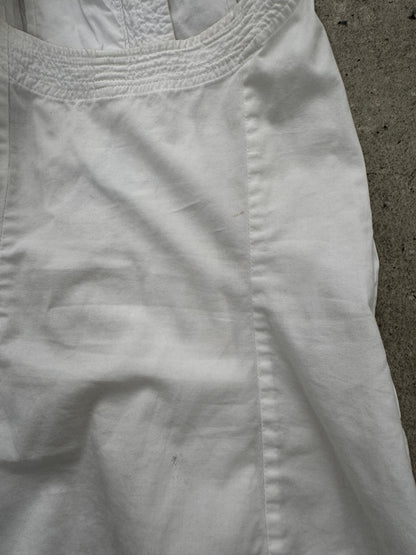DKNY 2000s pleated cotton sleeveless top in white, showing its classic design and lightweight fabric.