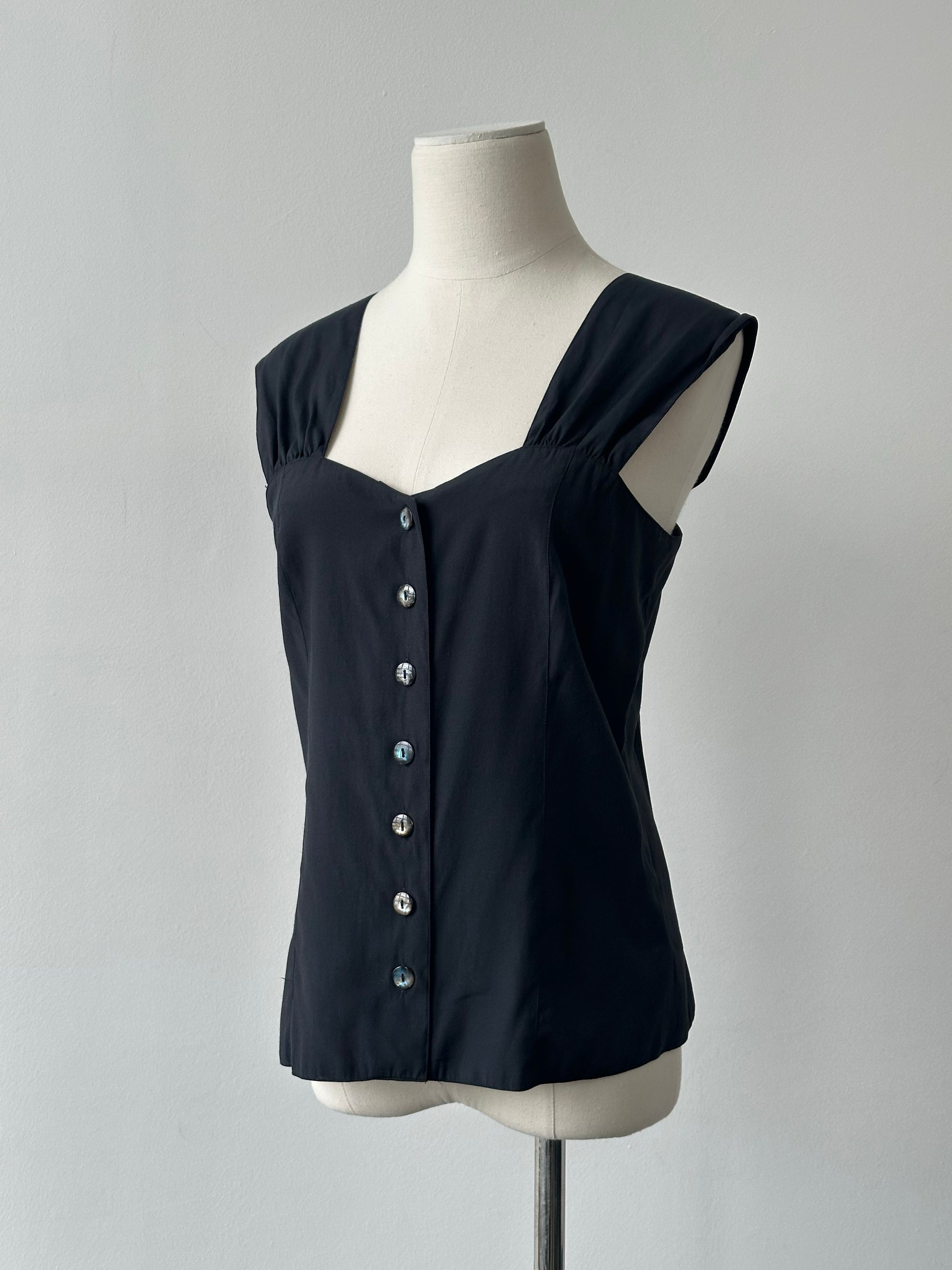 Vintage 1990s button-down sweetheart neckline top in size S, featuring classic design and soft fabric detail.