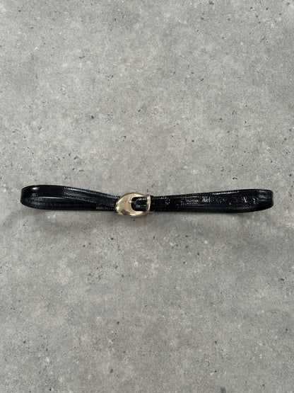 Jaeger 1990s patent leather sculptural buckle belt with W30-35 size, featuring a distinctive buckle and glossy finish.