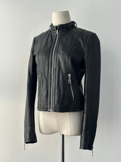 Vintage 2000s fitted moto lamb leather jacket in black, XS, with classic collar and zip front, styled for a sleek, edgy look.