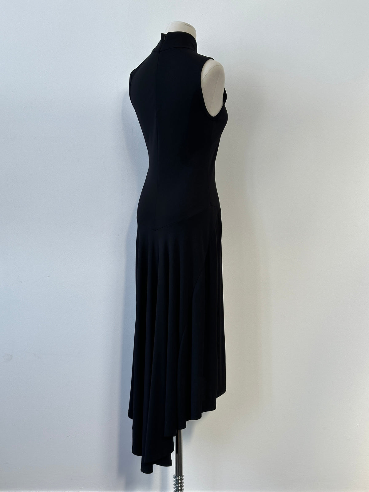 Donna Karan DKNY 1990s high neck asymmetrical sleeveless dress, beige fabric, close-up of the unique neckline and modern design.