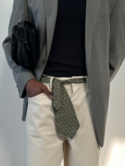Guess 1990s pure silk print tie featuring vibrant geometric patterns, designed for a stylish and sophisticated look.