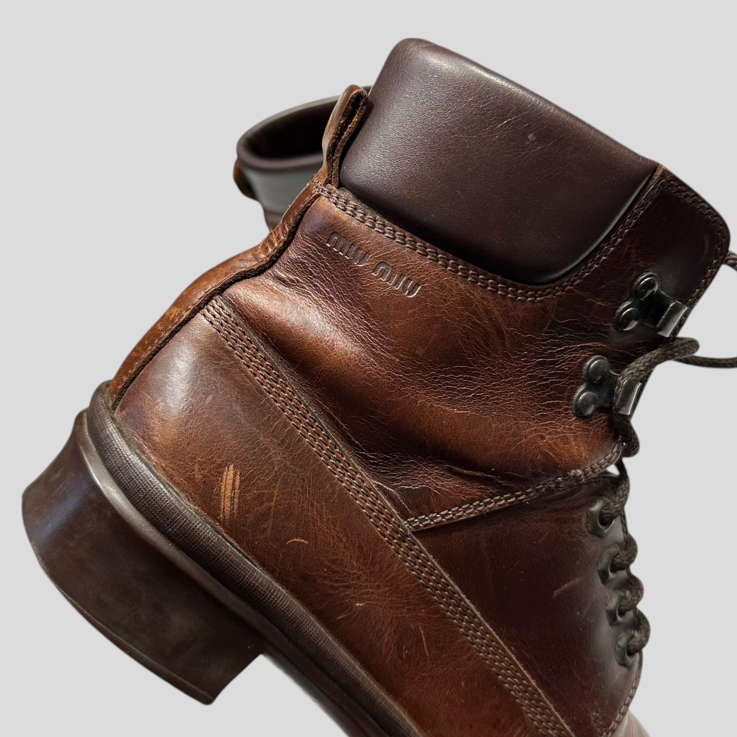 Miu Miu 00’s Padded Leather Embossed Logo Combat Boots - UK8 | DEFAULT TITLE, Brown