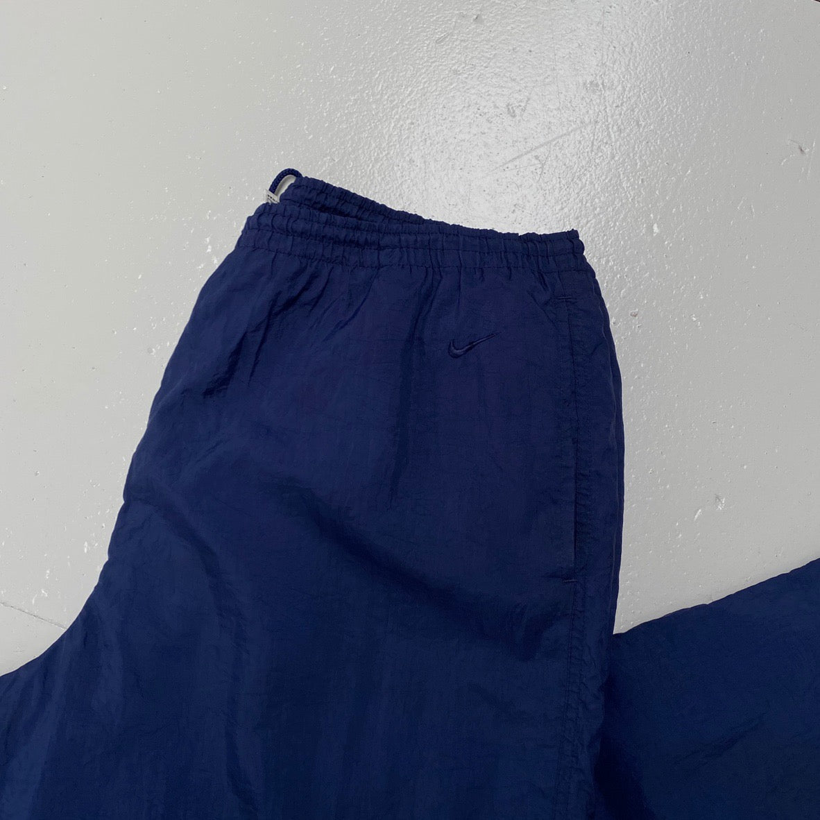 nike shell tracksuit bottoms