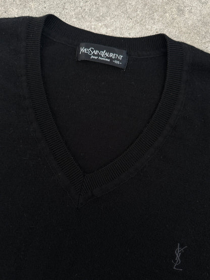 Yves Saint Laurent 1990s pure wool V-neck jumper in size M, shown in a close-up image highlighting the soft, textured fabric and classic design.
