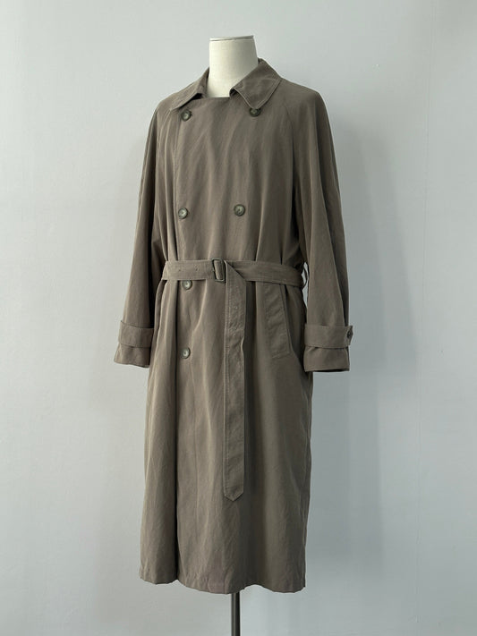Ralph Lauren Chaps 1990s belted trench coat in XL-XXL, displayed hanging with classic trench design and belted waist.
