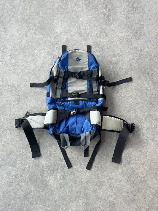 nike acg 1990s 40l technical trekking backpack in blue and grey, front view