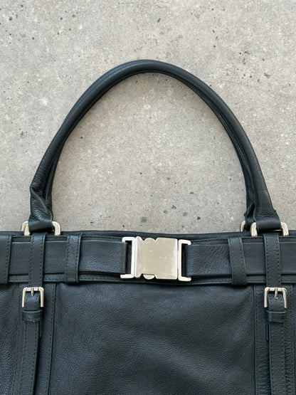 Vintage Italian 2000s leather shoulder bag with buckle closure, stylish and classic accessory with aged leather details.