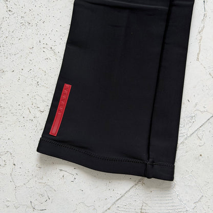 2000s prada sport neoprene panelled flared trousers | O/S, Red
