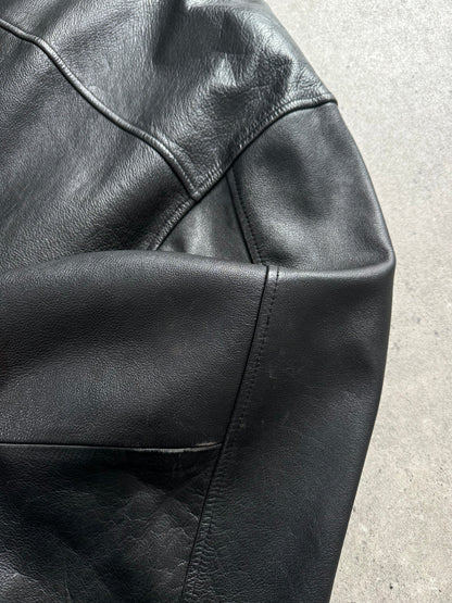 Vintage 1990s heavyweight leather jacket in XXL, minimal design with classic leather texture and vintage style.