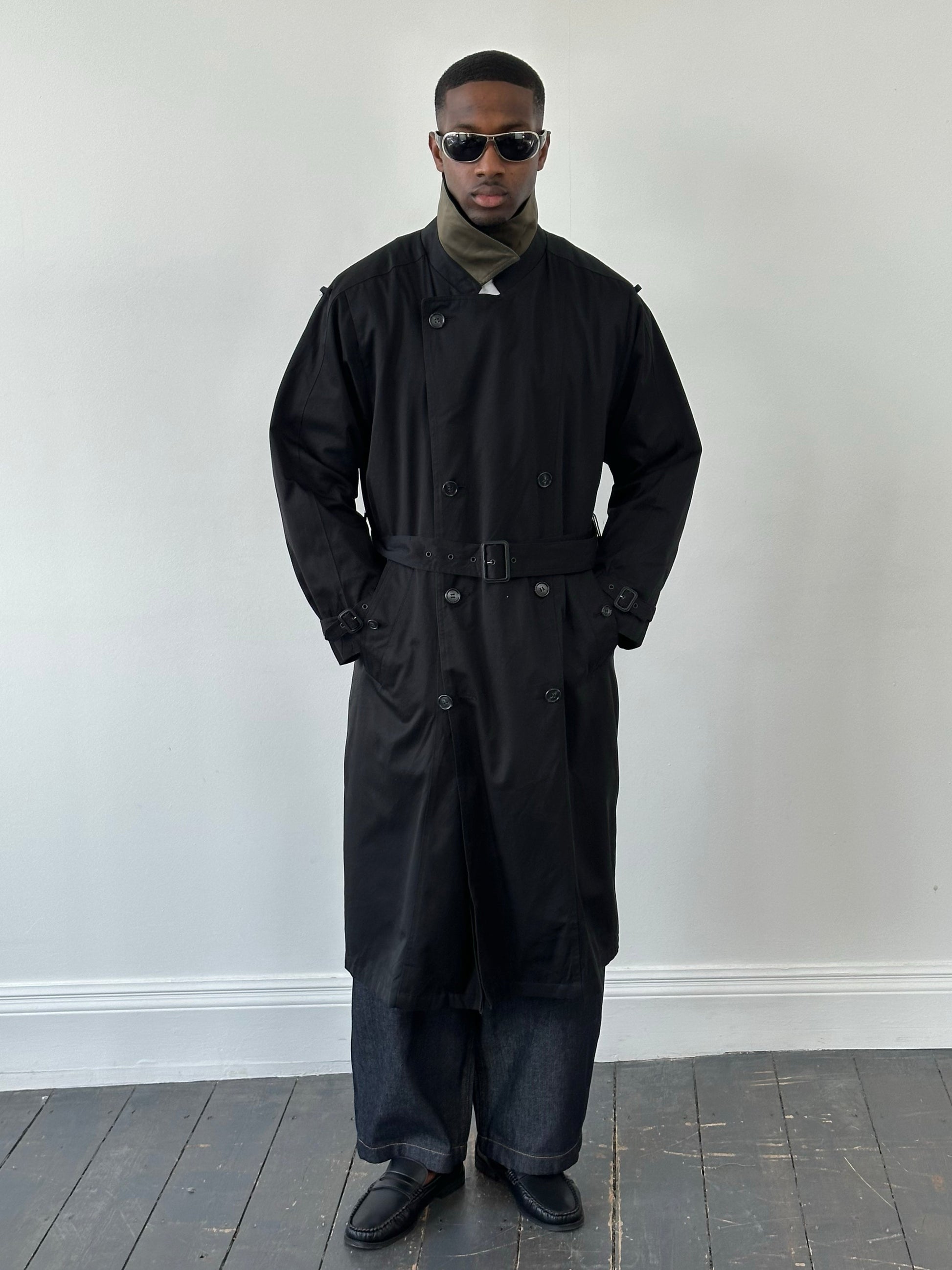 London Fog Towne 1990s double-breasted belted trench coat in classic beige, displayed on a hanger.