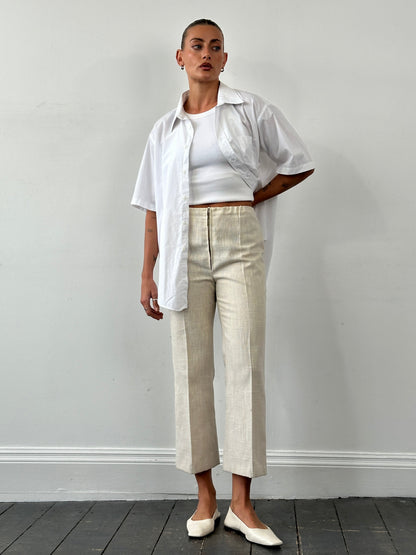 Vintage 1990s linen high waist cropped trousers, W26, shown with front view, showcasing classic high-rise fit and lightweight fabric.