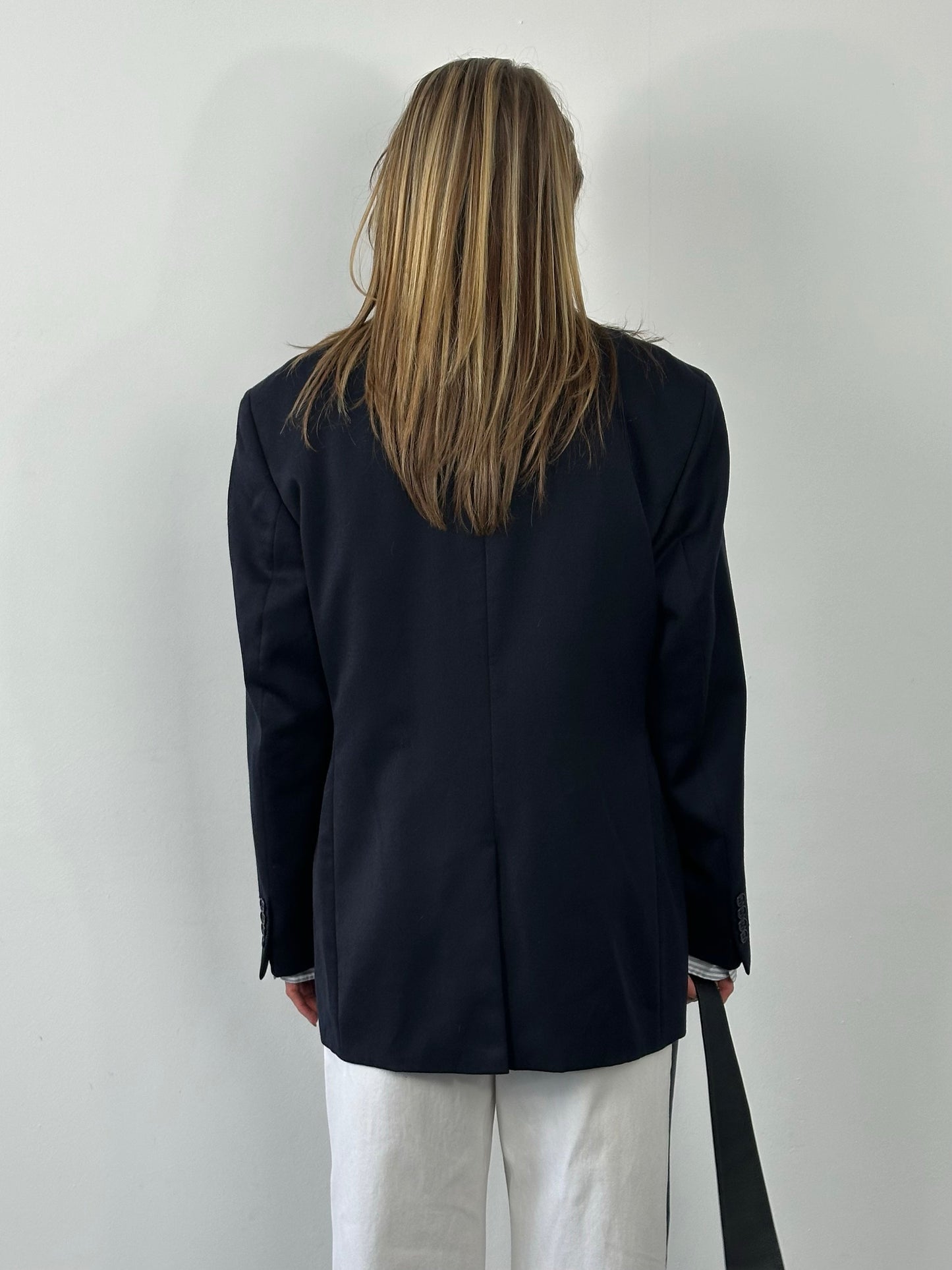 Yves Saint Laurent 1990s pure wool single-breasted blazer in size L/XL, tailored fit with classic lapel and button closure.