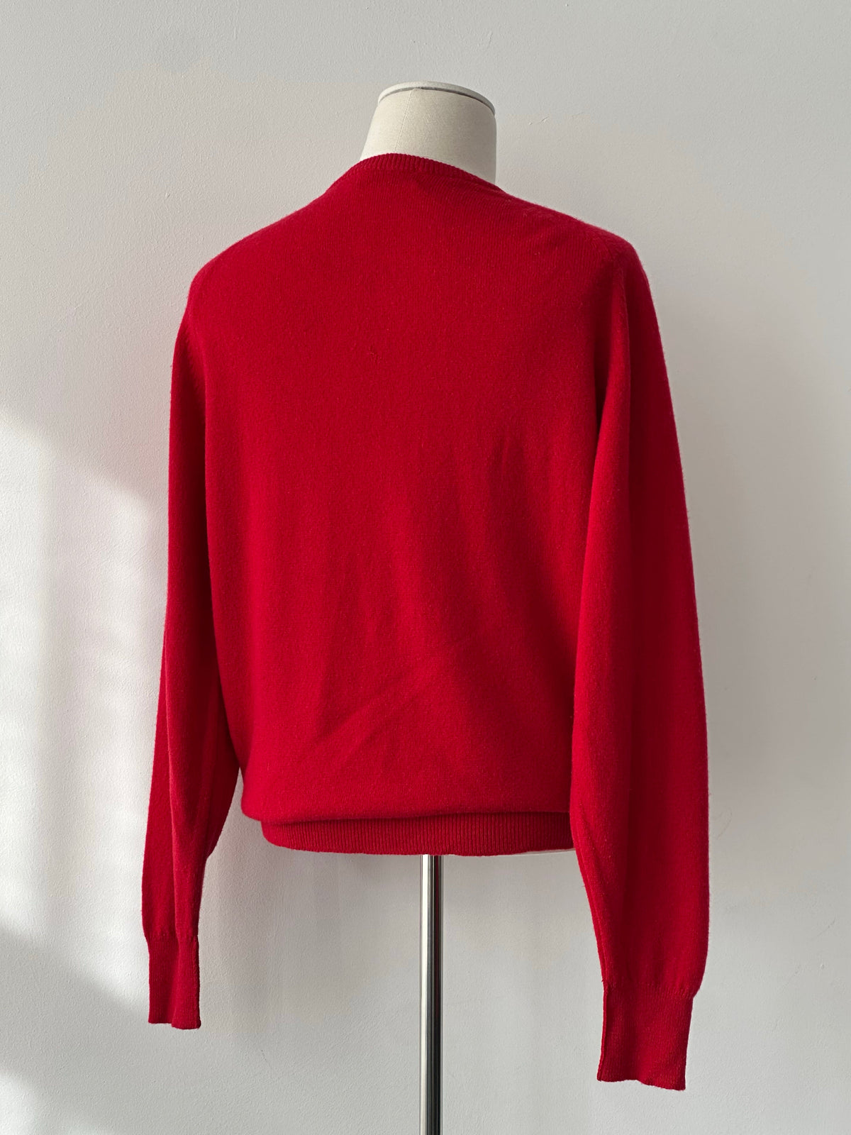 Burberry 1990s pure lambswool logo knit jumper in size M, featuring classic plaid pattern and ribbed cuffs and collar.