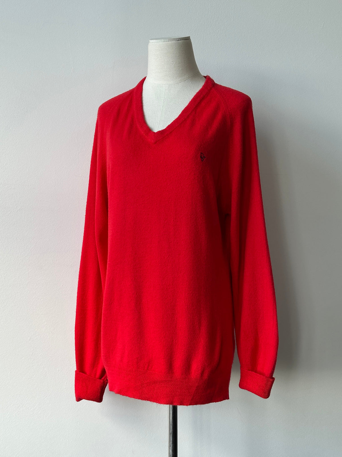 Christian Dior 1990s V-neck logo jumper in black, featuring the iconic Dior branding and classic knit design.