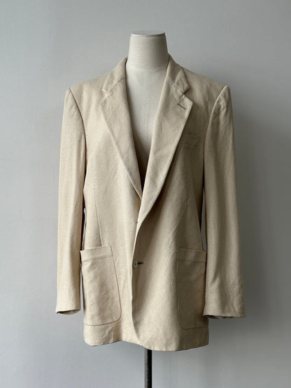 Christian Dior 1980s pure silk blazer featuring a single-breasted design, tailored fit, and elegant vintage style.