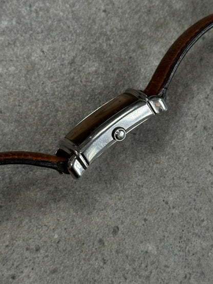 Emporio Armani 2000s leather watch with round dial and black leather strap, showcasing classic elegance and sophisticated style.