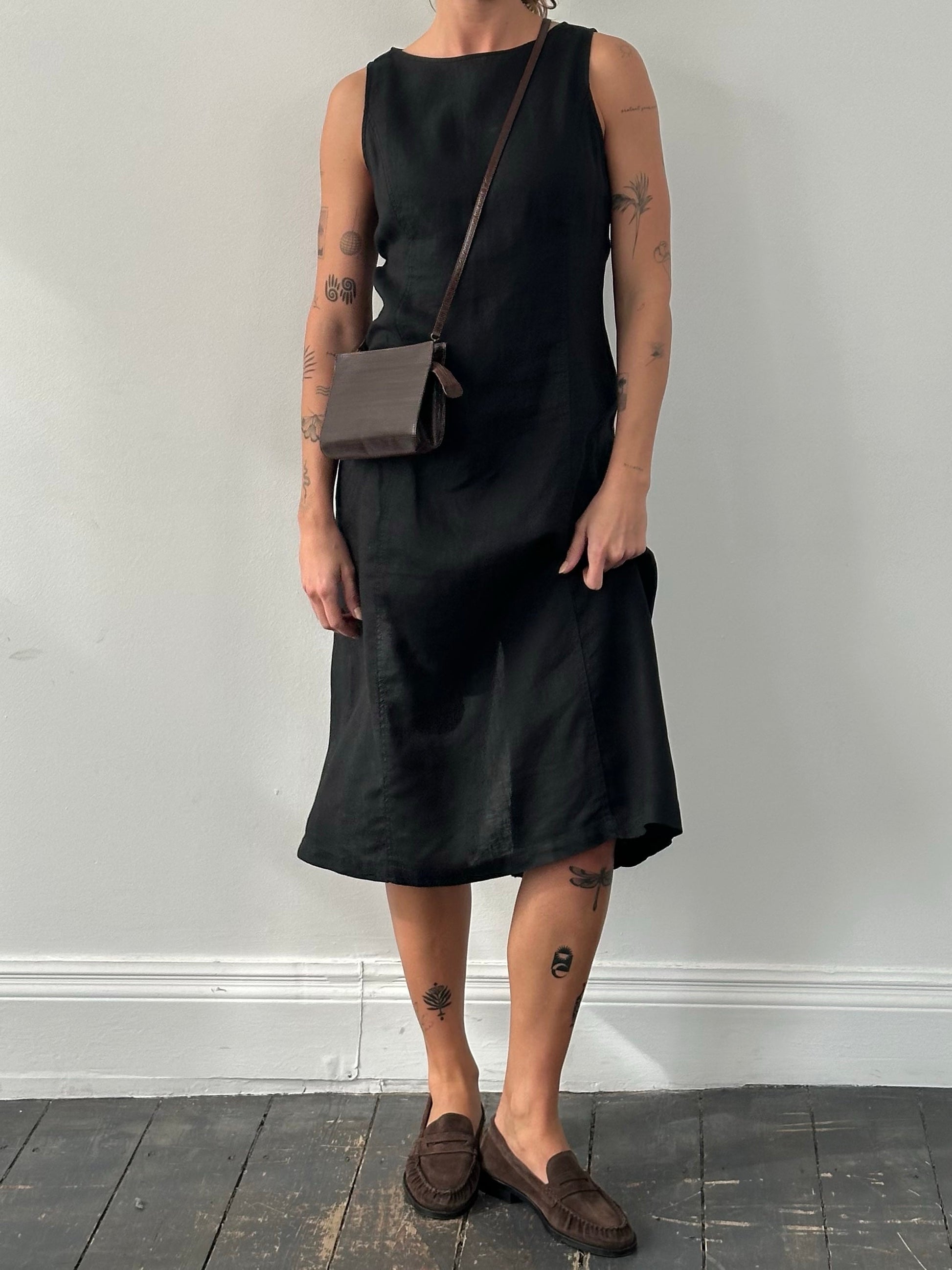 Armani Jeans 1990s pure linen sleeveless dress in beige, front view showing V-neckline and fitted silhouette.