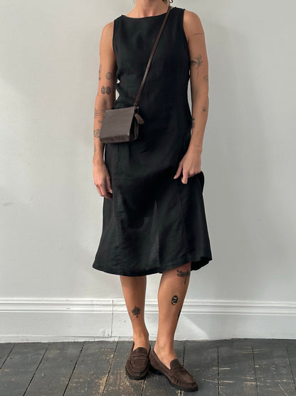 Armani Jeans 1990s pure linen sleeveless dress in beige, front view showing V-neckline and fitted silhouette.