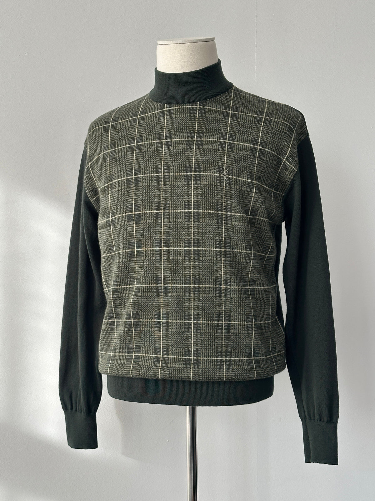 Yves Saint Laurent 1990s pure wool check high neck jumper in S-M, featuring a classic plaid pattern and a fitted high neckline.