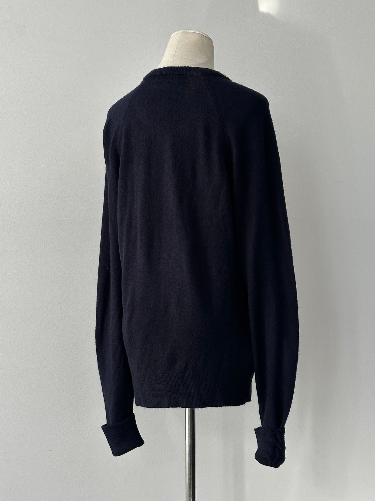 Christian Dior 1990s V-neck logo jumper in black, featuring the iconic Dior logo and a classic V-neck design.