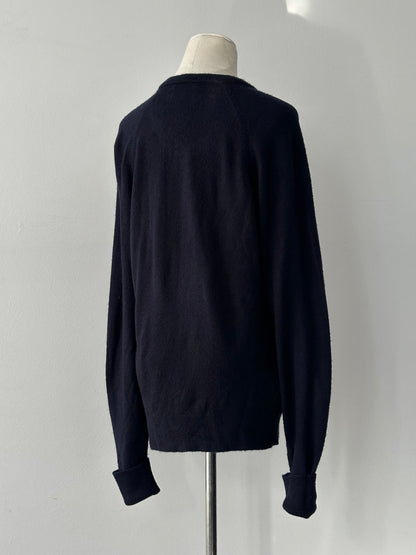 Christian Dior 1990s V-neck logo jumper in black, featuring the iconic Dior logo and a classic V-neck design.