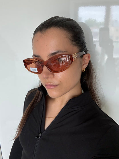 Miu Miu Transparent Cat Eye Sunglasses | O/S, Gold