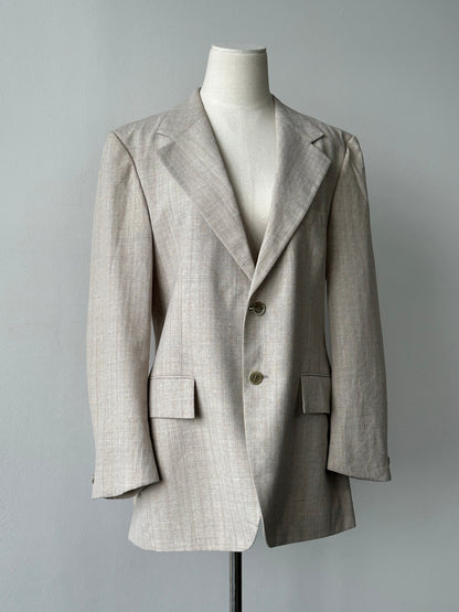Yves Saint Laurent 1980s wool stripe single-breasted blazer in size M, featuring classic tailored fit and bold stripe pattern.