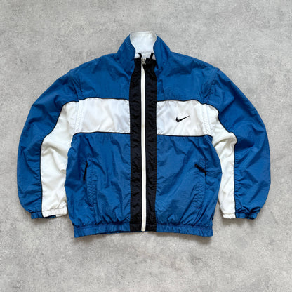 Nike 1990s lightweight convertible spellout shell jacket (M)