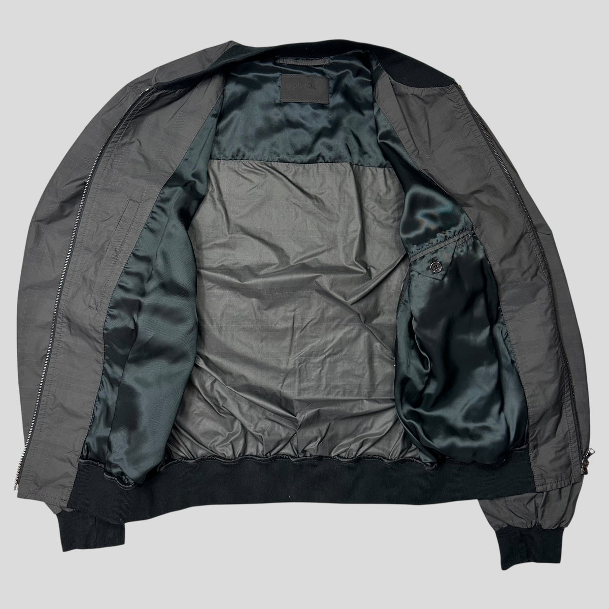 Prada Milano 2010 Shadow Plaid Nylon Bomber Jacket - IT54 (L) | Grey