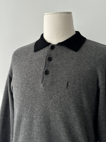 Yves Saint Laurent 1990s wool polo jumper in black, featuring a classic collar and ribbed cuffs, size S-M.