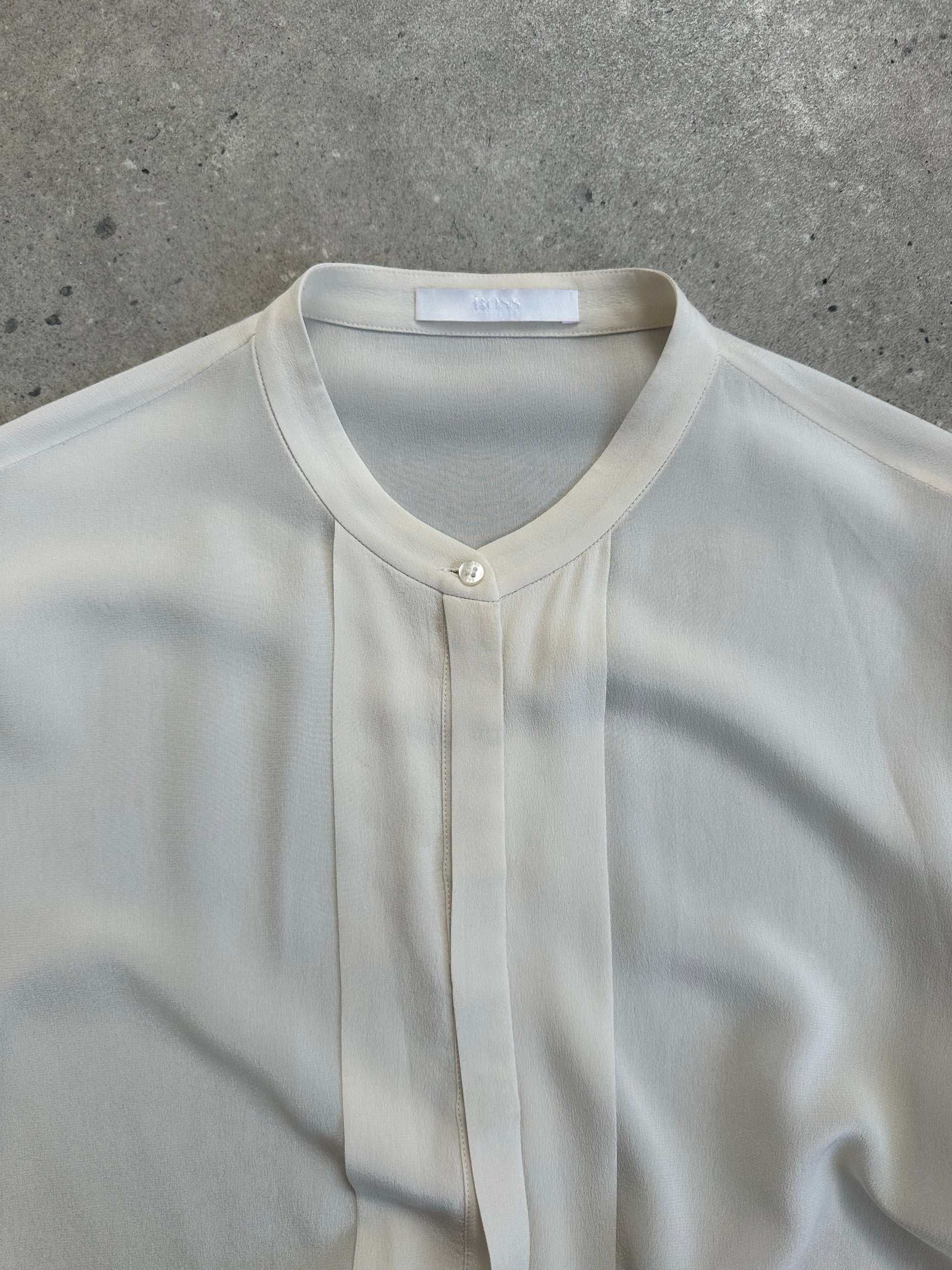 Hugo Boss pure silk collarless shirt in minimal style, displaying smooth fabric and sleek design, size M.
