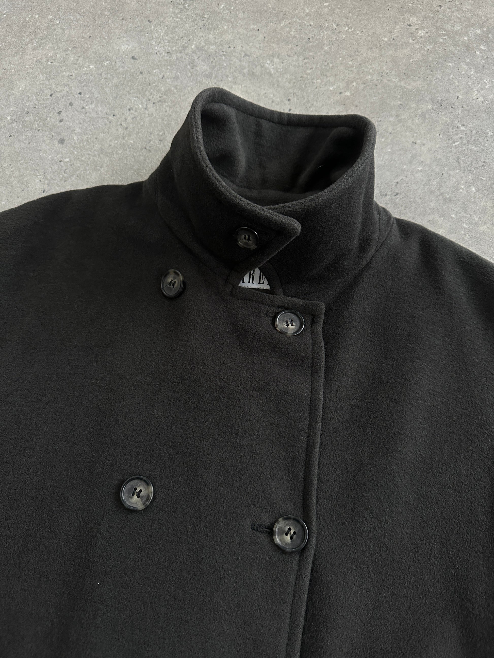 Marella 1990s virgin wool double-breasted coat in size L/XL displayed on a hanger, showcasing classic style and tailored fit.