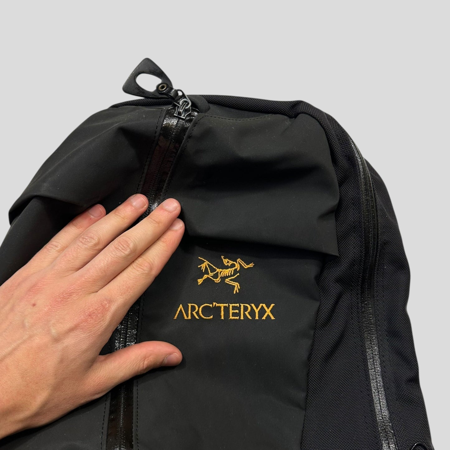 Arc’teryx Arro 22 Waterproof Backpack - 24k Gold | O/S, Black
