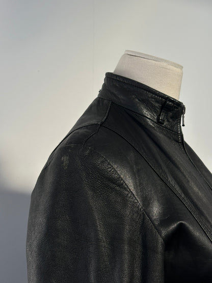 Italian vintage 1990s double zip belted leather jacket, XS, featuring classic design and rich leather texture.