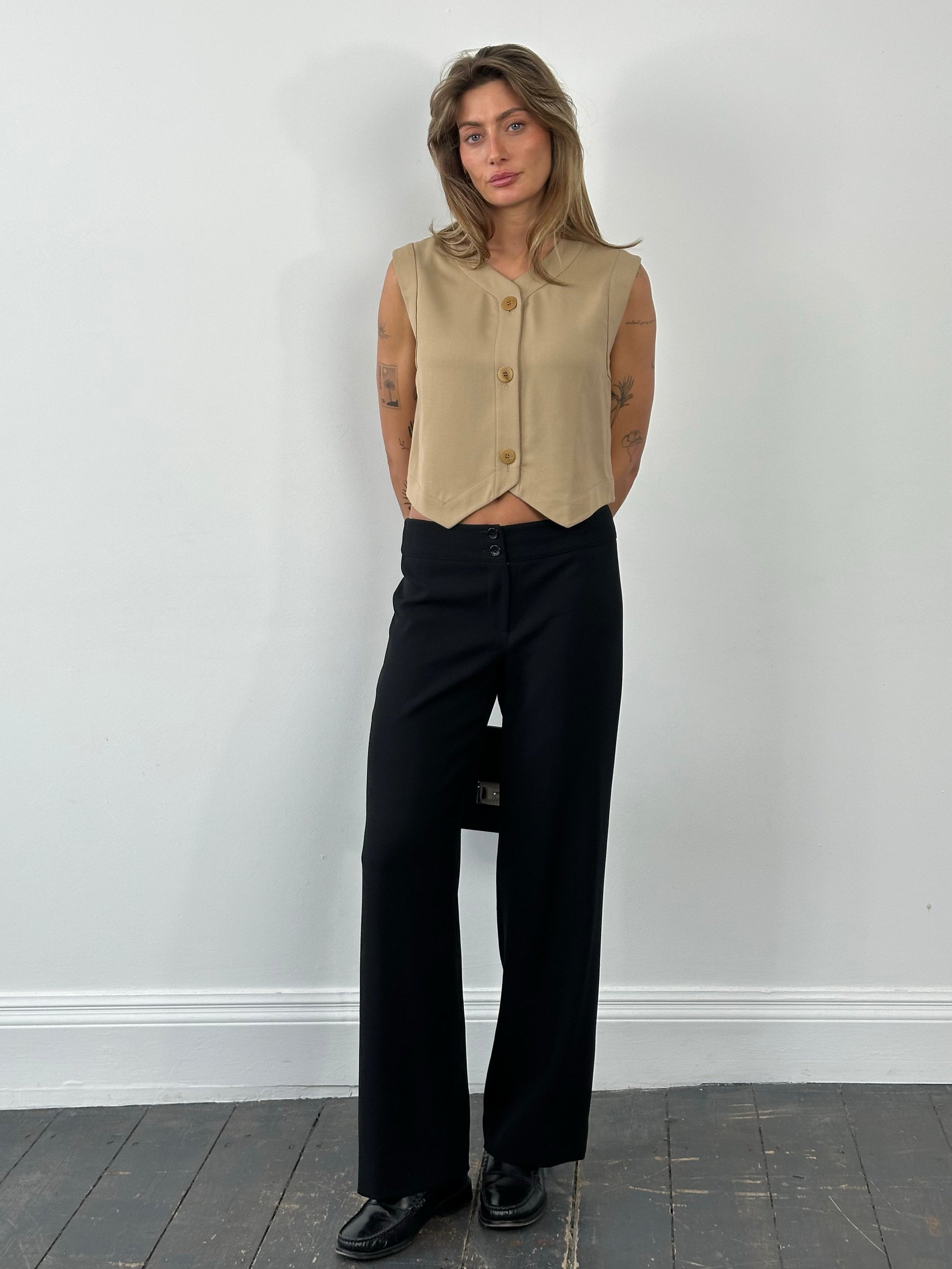 Armani Collezioni 1990s wool wide-leg trousers in size W30, beige color, featuring high-waist and tailored fit.