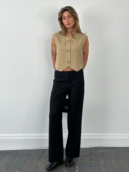 Armani Collezioni 1990s wool wide-leg trousers in size W30, beige color, featuring high-waist and tailored fit.