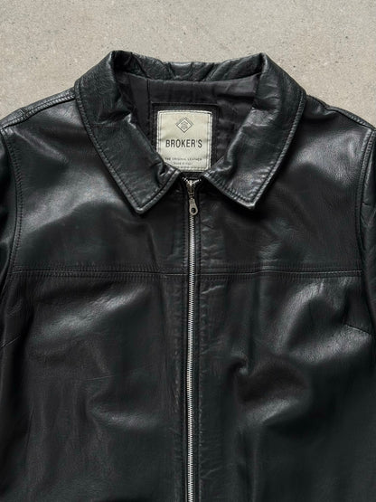 Vintage Italian 1990s leather boxy jacket in brown leather, front view showing classic collar and button details.