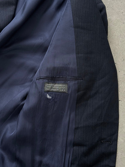 Christian Dior Monsieur 1980s wool striped blazer, size 40R, shown on a hanger with navy and gray striped fabric.