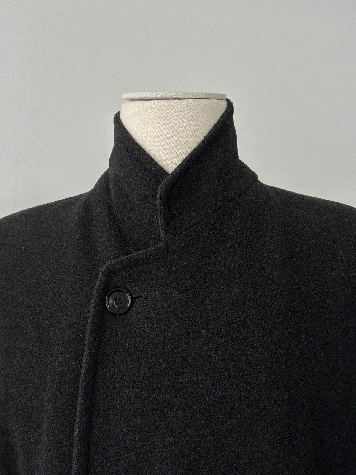 Vintage 1990s wool cashmere high neck belted coat, size L, featuring a classic design and natural wool and cashmere fabric.