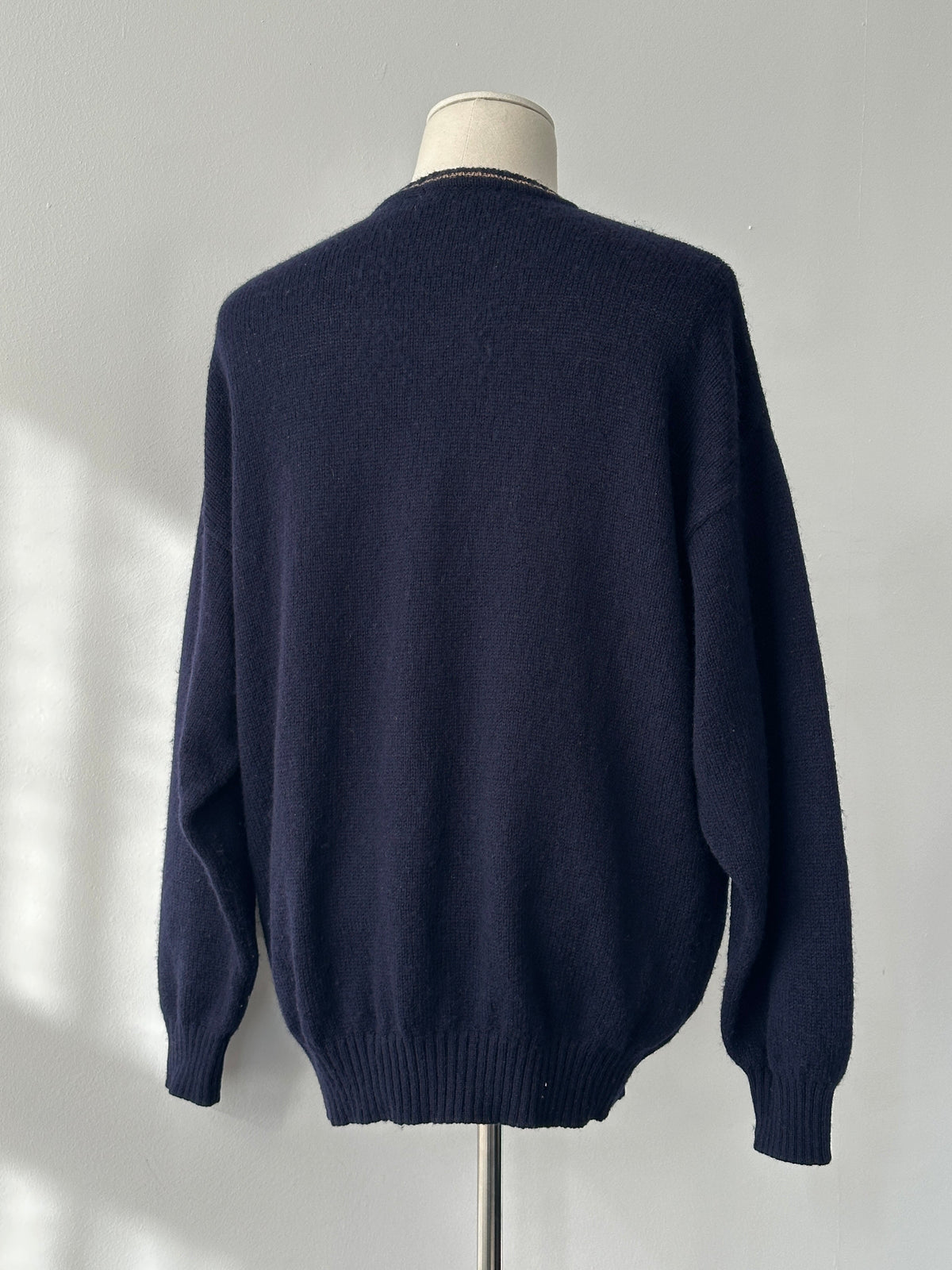 Burberry 1990s pure wool V-neck jumper in XL, cream color, featuring classic knit texture and brand label visible on the collar.