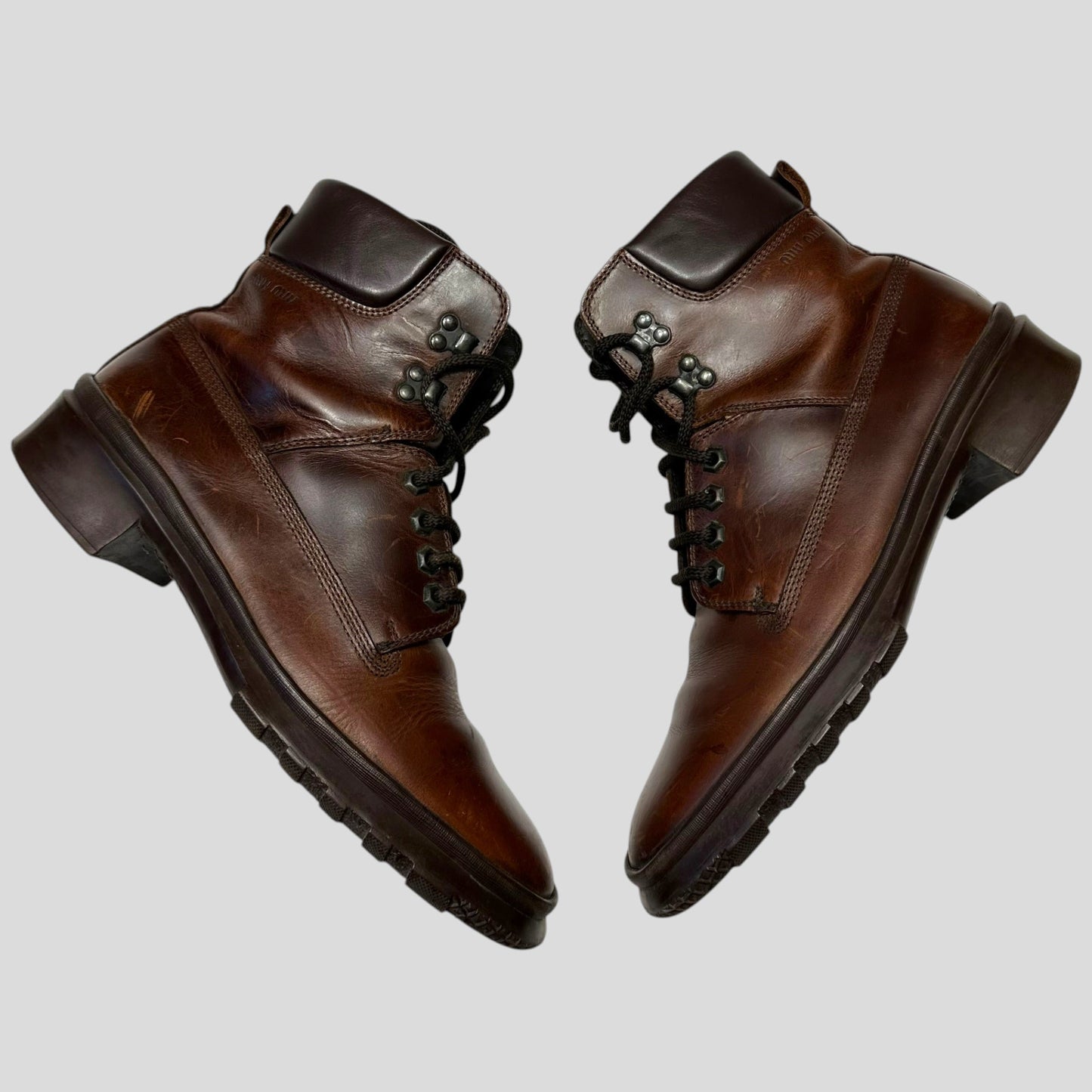 Miu Miu 00’s Padded Leather Embossed Logo Combat Boots - UK8 | DEFAULT TITLE, Brown