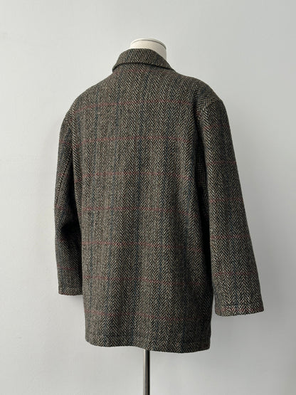 Italian vintage 1980s pure wool herringbone coat in size L, classic design with a timeless herringbone pattern.