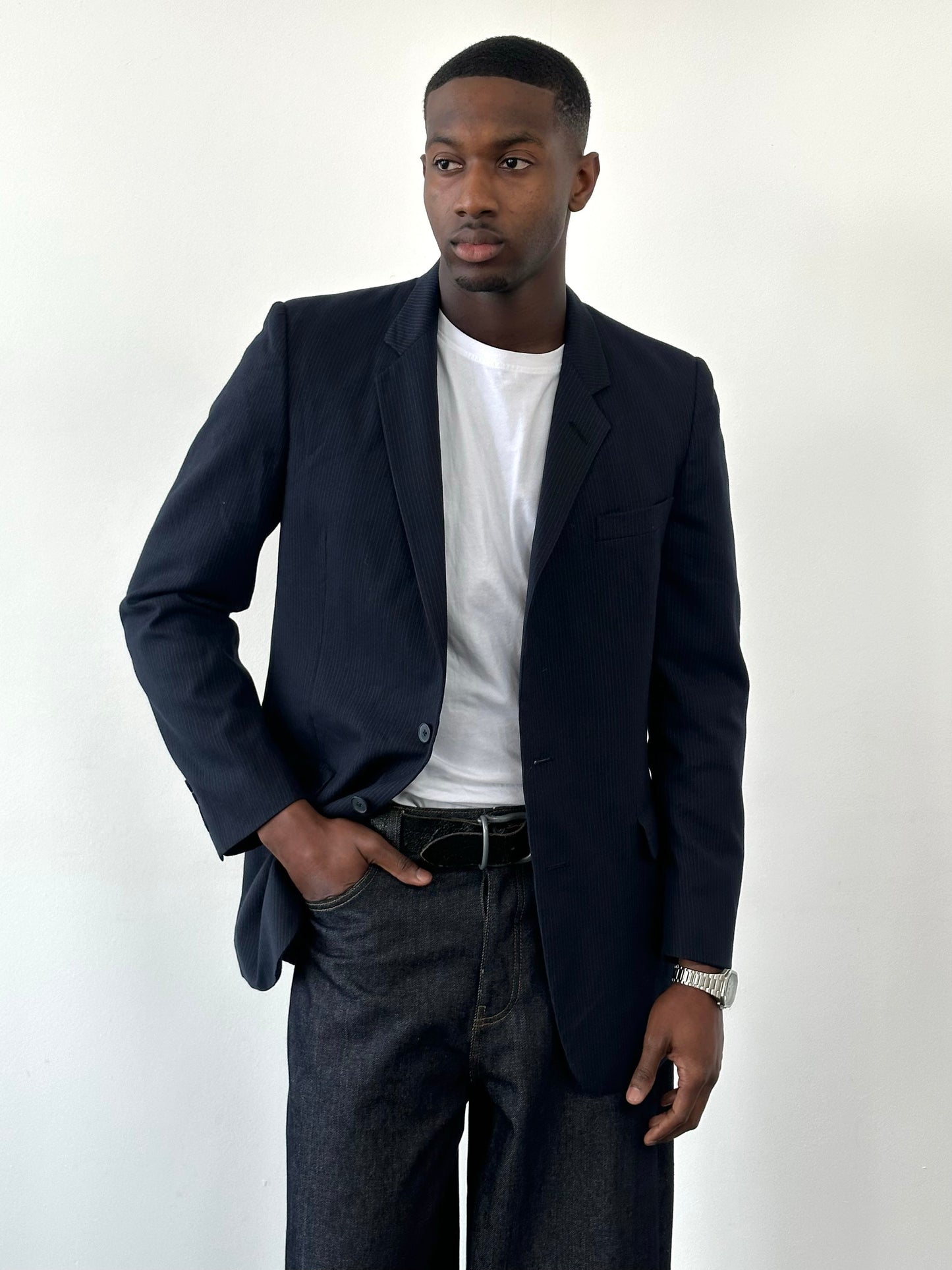 Christian Dior Monsieur 1980s wool striped blazer, size 40R, with classic tailored fit and bold striped pattern.