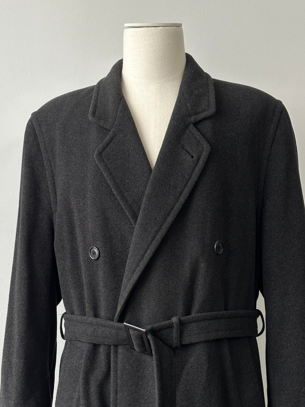 Vintage 1990s wool and cashmere high-neck belted coat, stylish and warm, shown in classic beige color.