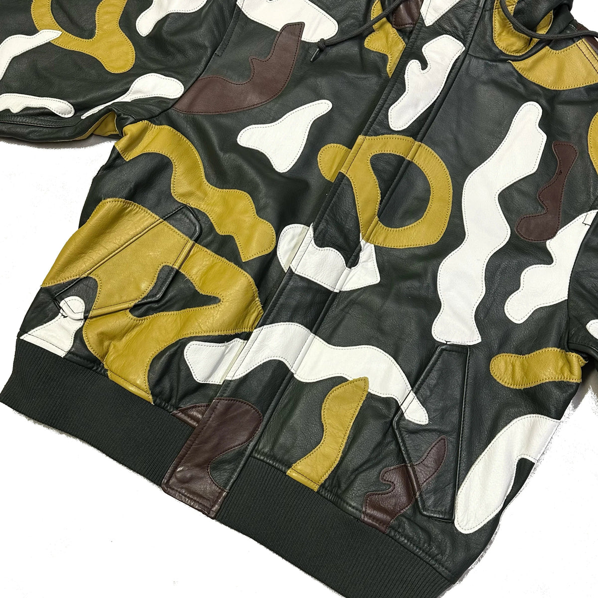 Supreme FW19 camouflage hooded leather jacket in olive, tan, and white.