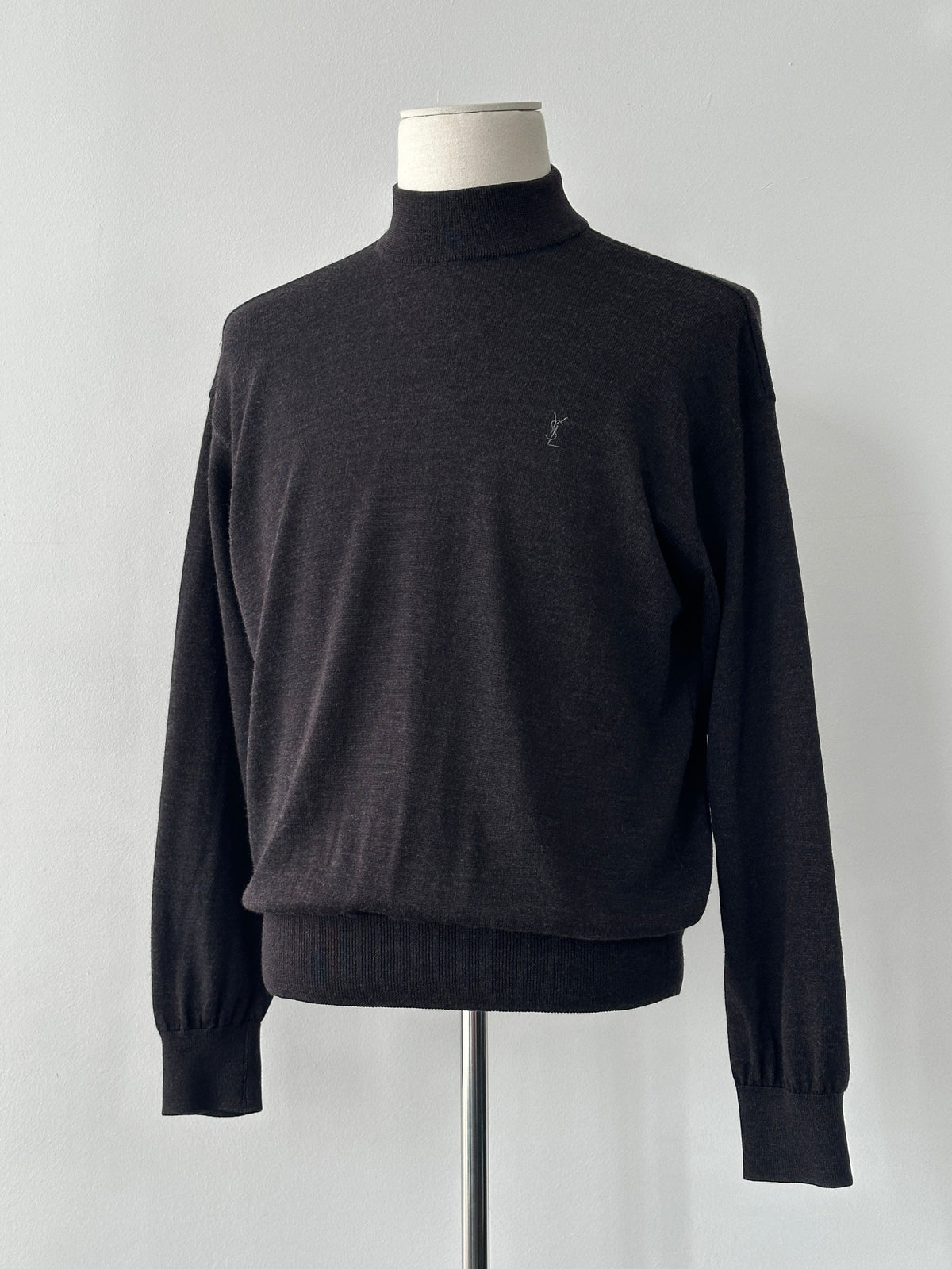 Yves Saint Laurent 1990s wool high-neck jumper, medium size, cream-colored with ribbed collar and cuffs, classic vintage style.