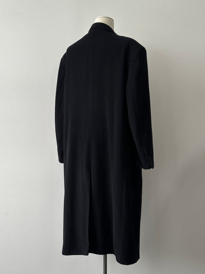 Pierre Cardin 1990s wool cashmere double-breasted coat in XXL, shown hanging on a wooden rack with classic design and tailored fit.