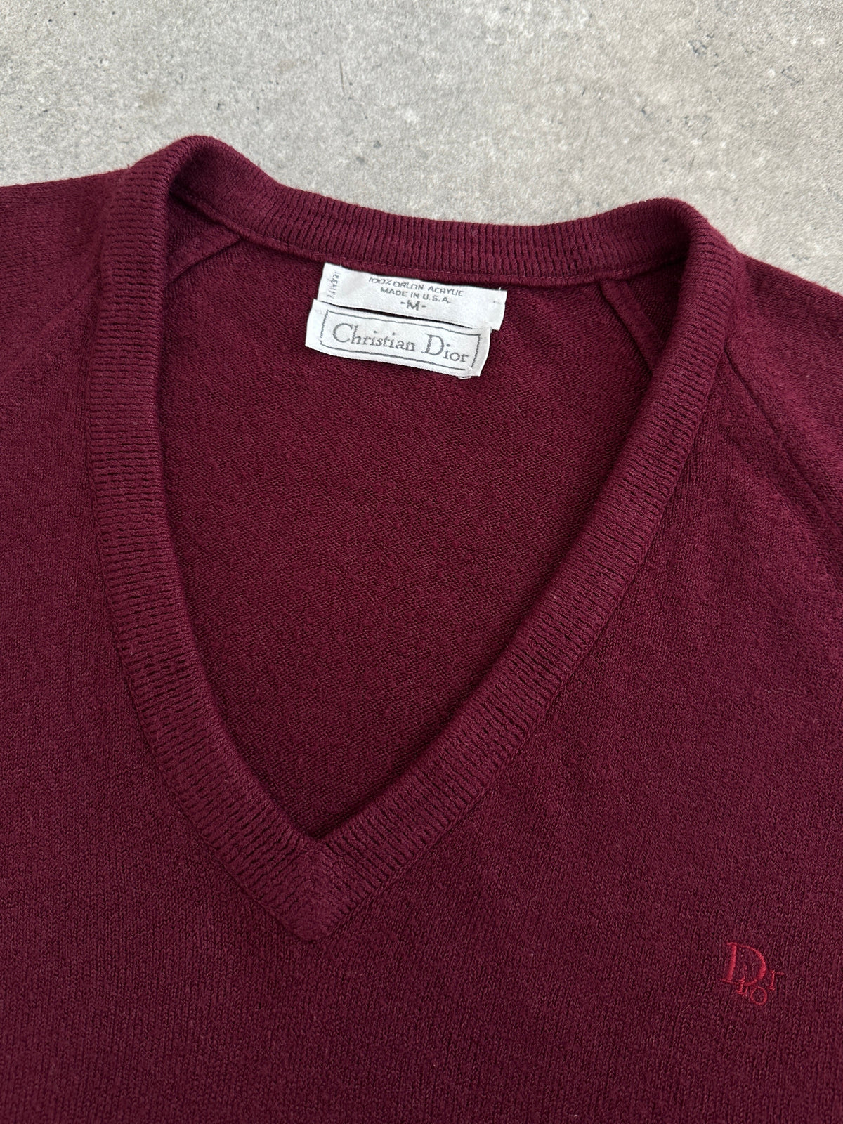 Christian Dior 1990s V-neck logo jumper in size M, featuring the iconic Dior branding and classic knit design.